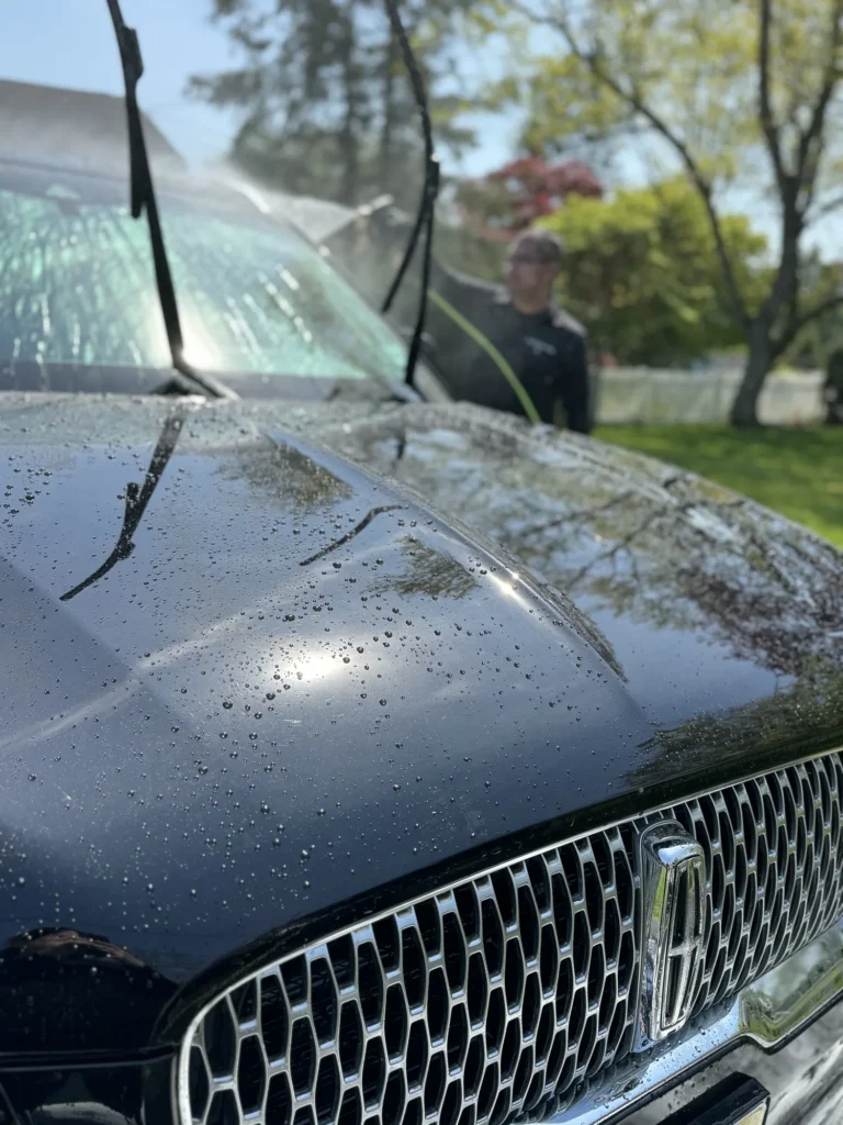 Water beading on a freshly coated hood
